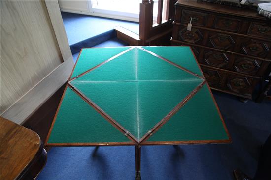A pair of ebony strung burr walnut envelope card tables, W.1ft 11in. D.1ft 11in. H.2ft 5in.